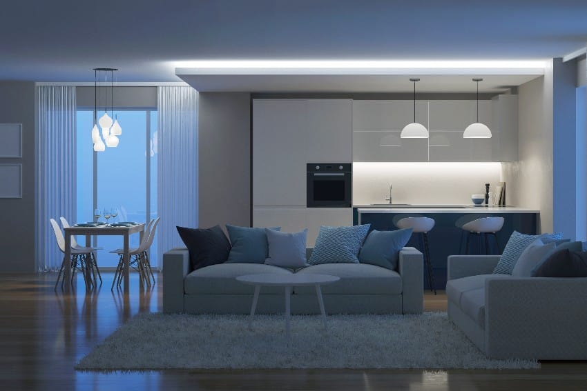 A beautiful valance evening lighting in open living area, kitchen and dining