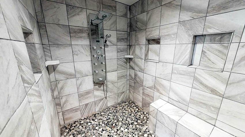 Shower area with alcove, tiles and granite tiles