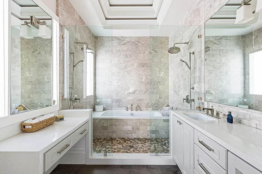 Shower with tub inside and mosaic tile flooring